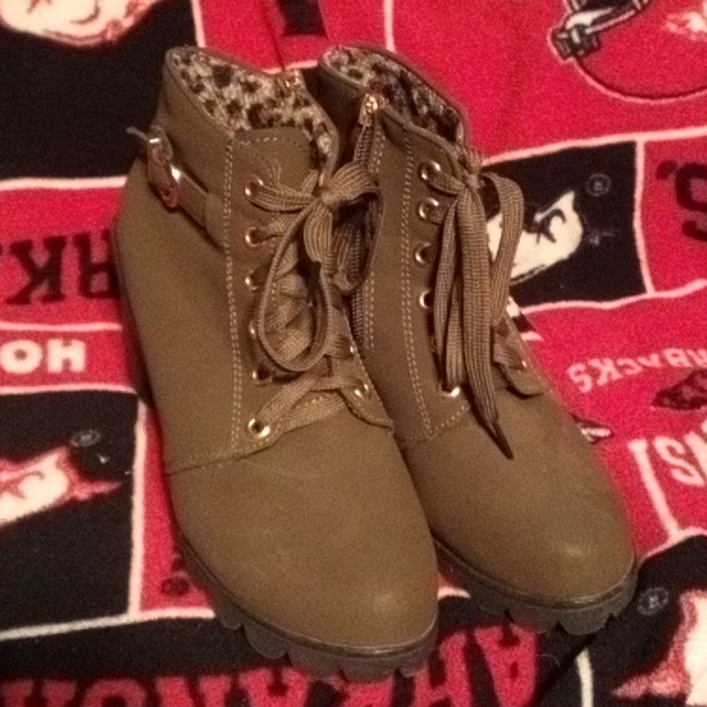 Army green high heel booties with leopard print lining.